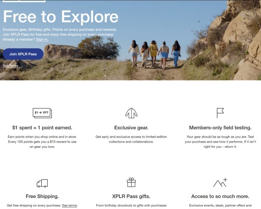The North Face XPLR Pass page: Free to Explore hero with hikers, plus perks like $1 spent = 1 point and free shipping